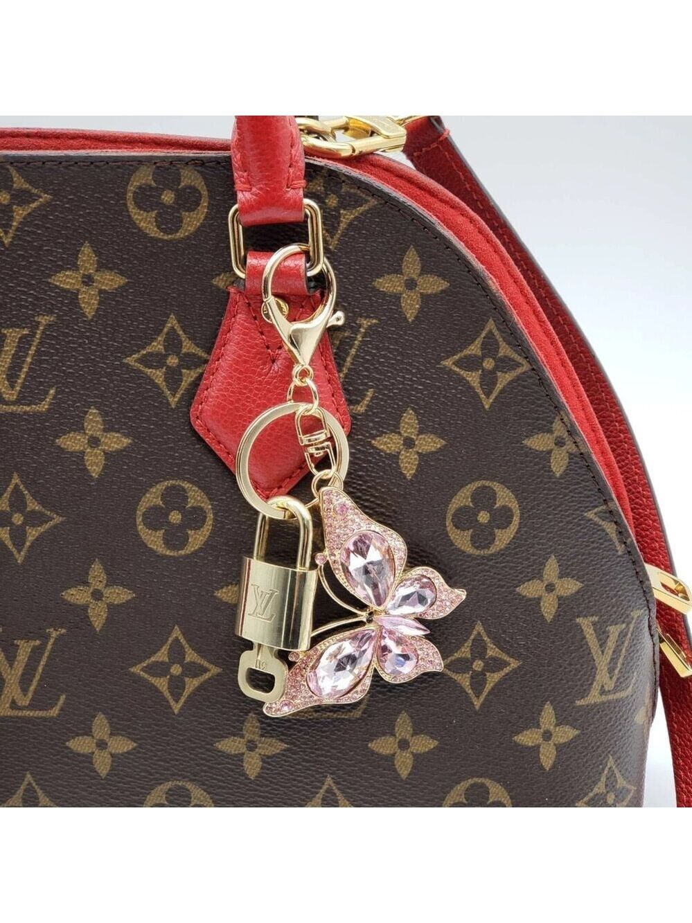 Authentic Louis Vuitton Lock & Key with unbranded Butterfly Bagcharm, Keycharm